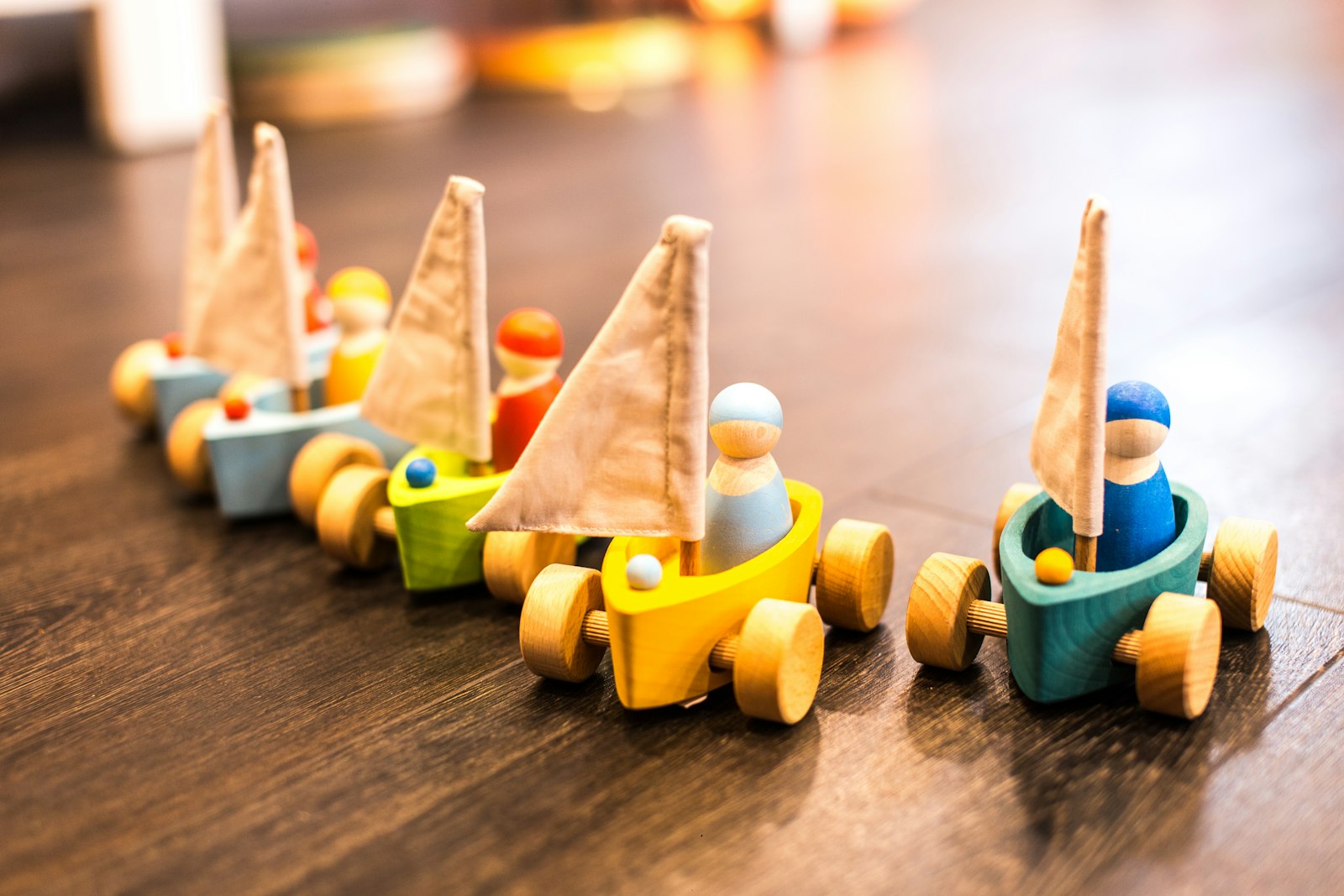 Wooden pull-along toy trucks
